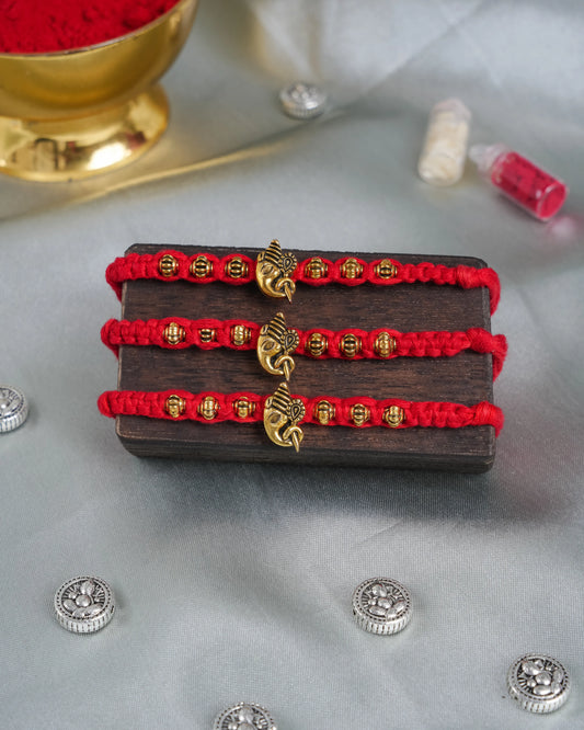 Ek Dant Antique Gold Rakhi Set