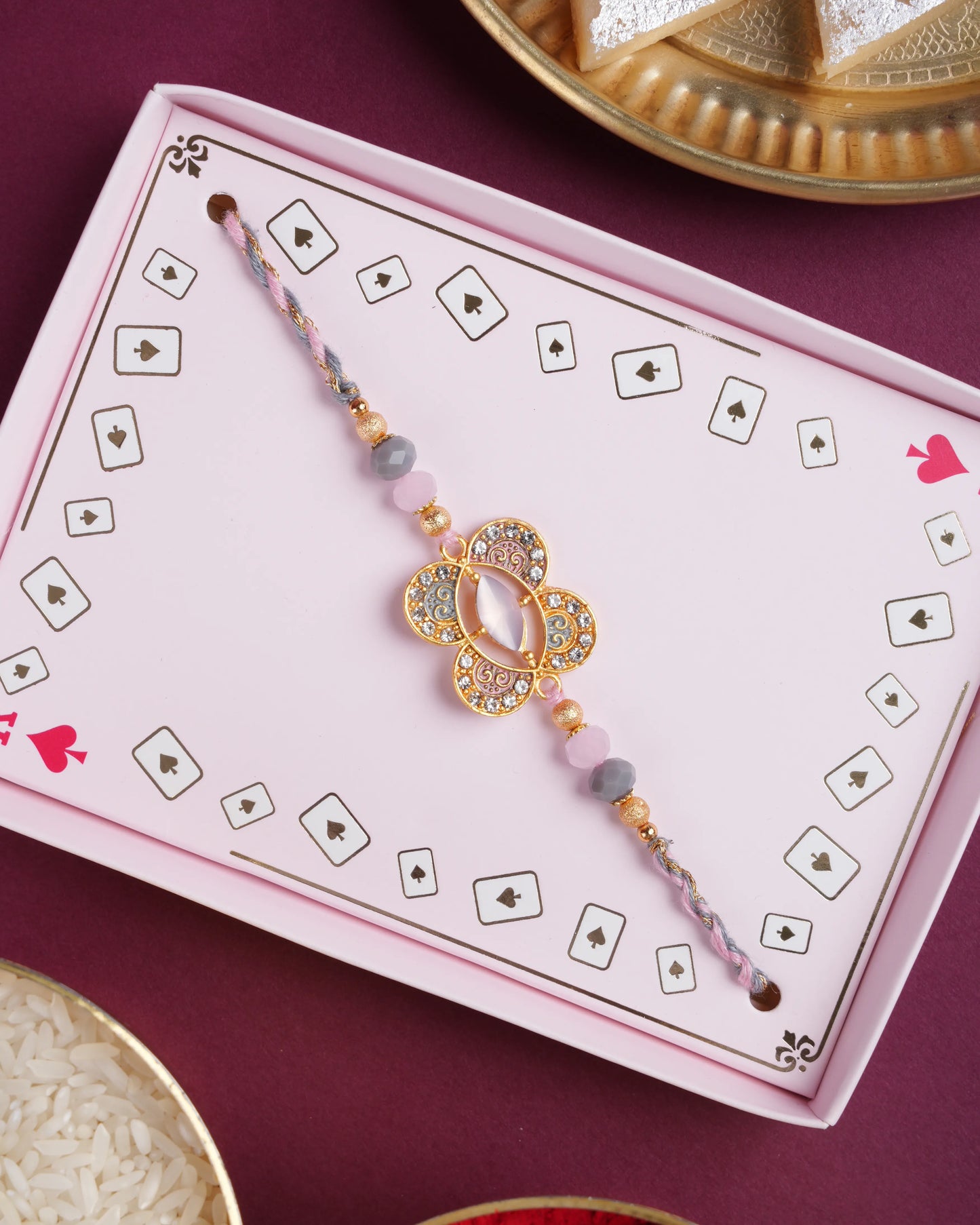 Elegant Pink Stone Rakhi