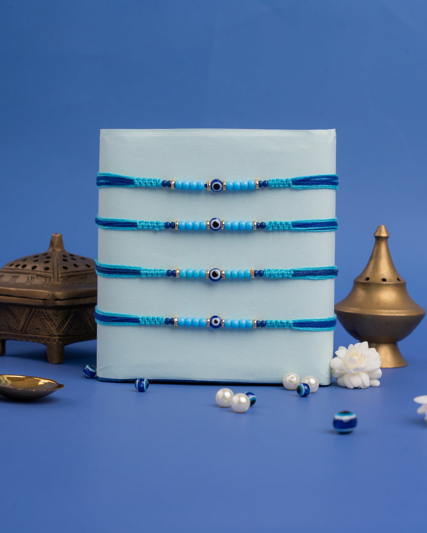 Delicate Evil Eye Rakhi set (4pc)