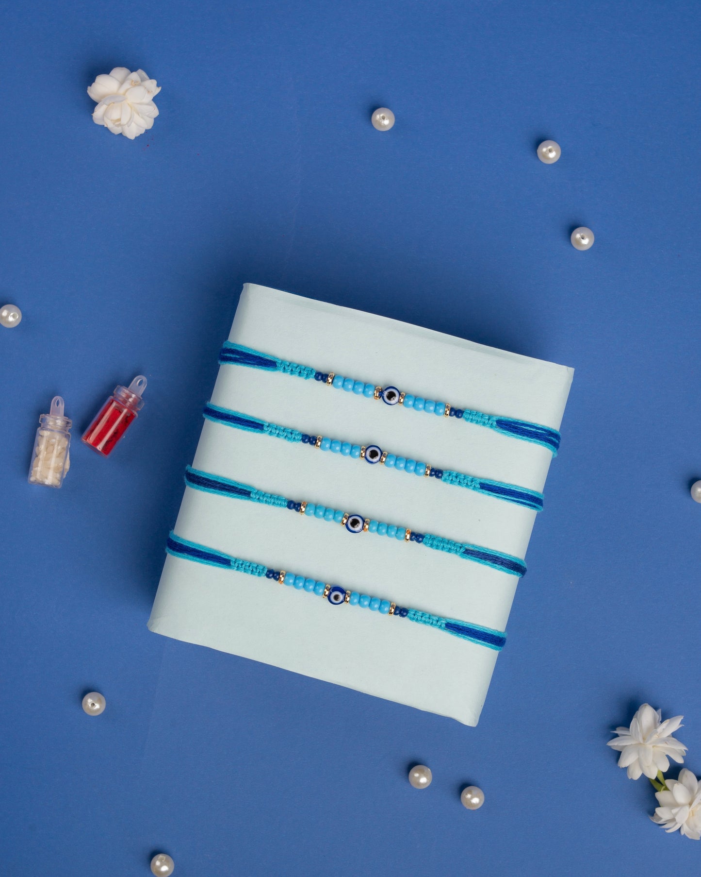 Delicate Evil Eye Rakhi set (4pc)