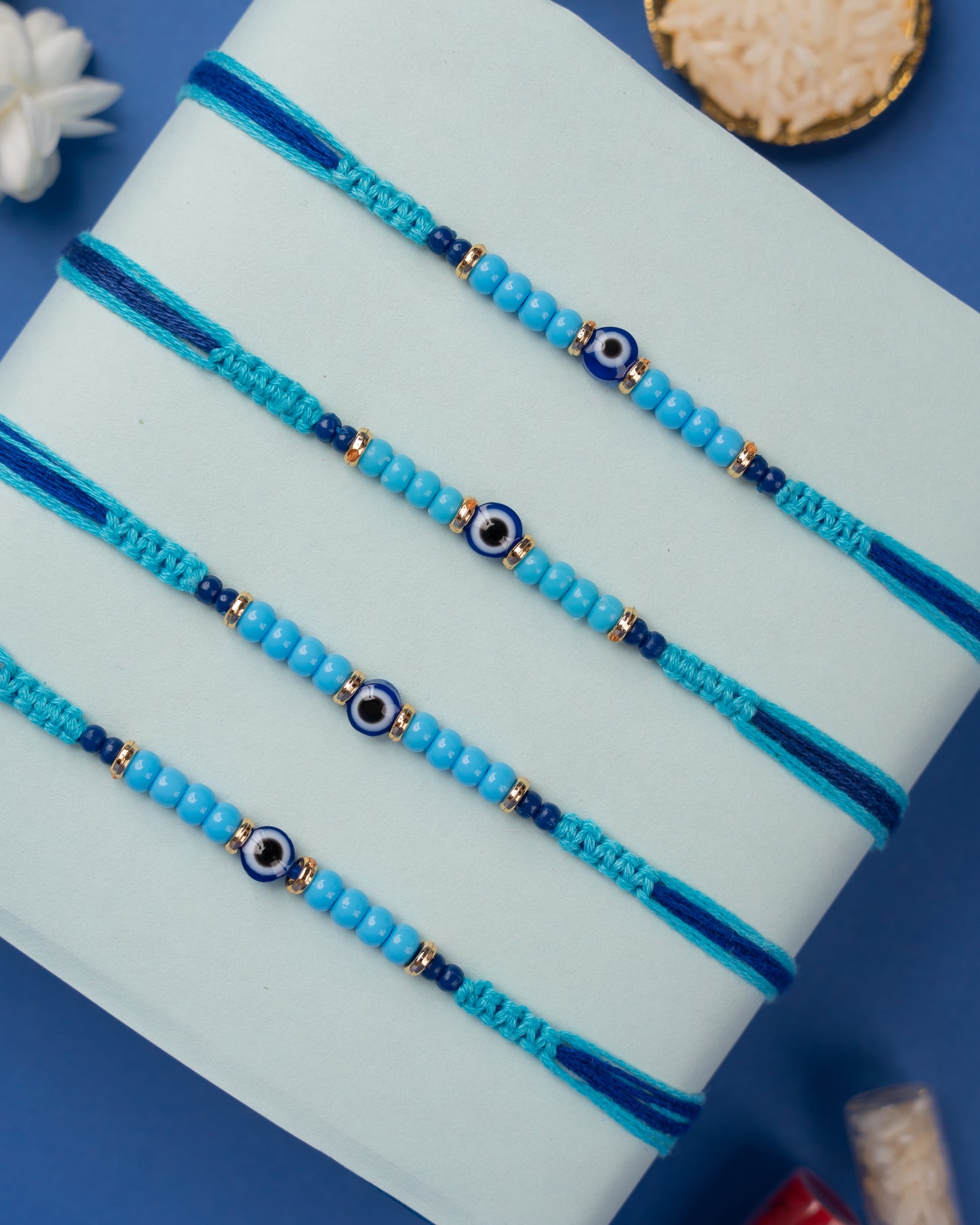 Delicate Evil Eye Rakhi set (4pc)